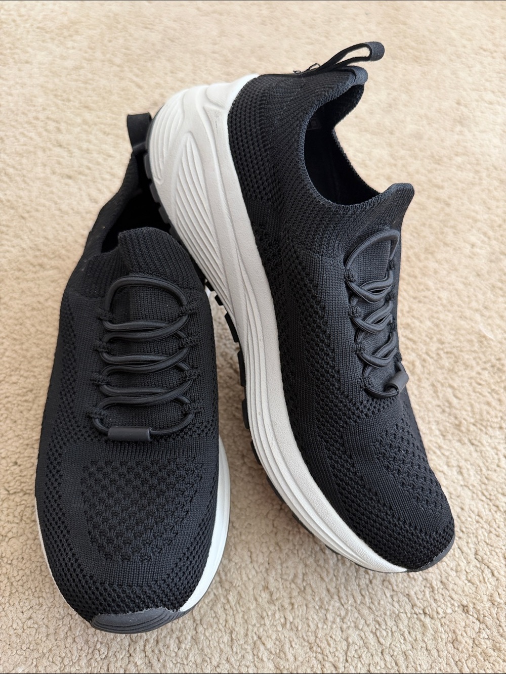 Skechers Women's Black Knit Slip-On Sneakers with White Sole